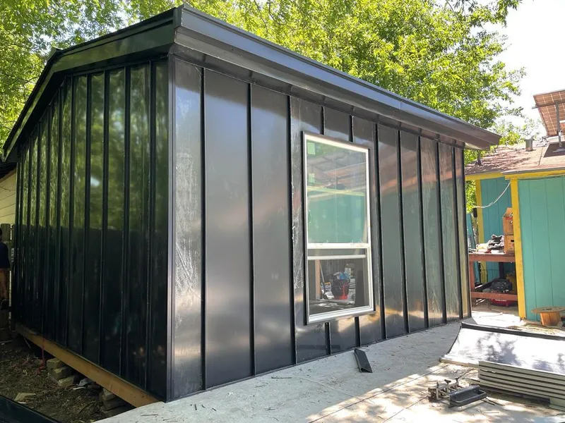 Black standing seam metal wall panels for Roof Inspection in Spring Lake